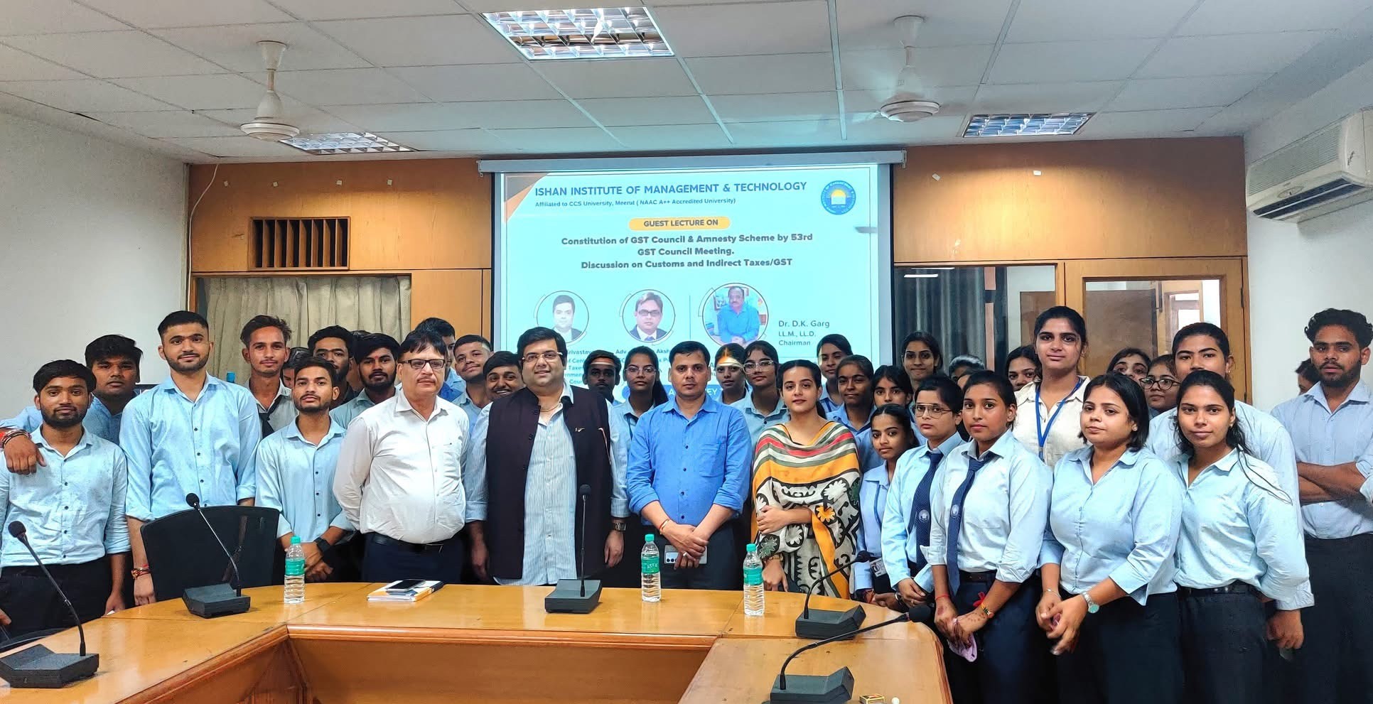 Ishan IIMT M Com students gaining practical GST knowledge through an expert session.